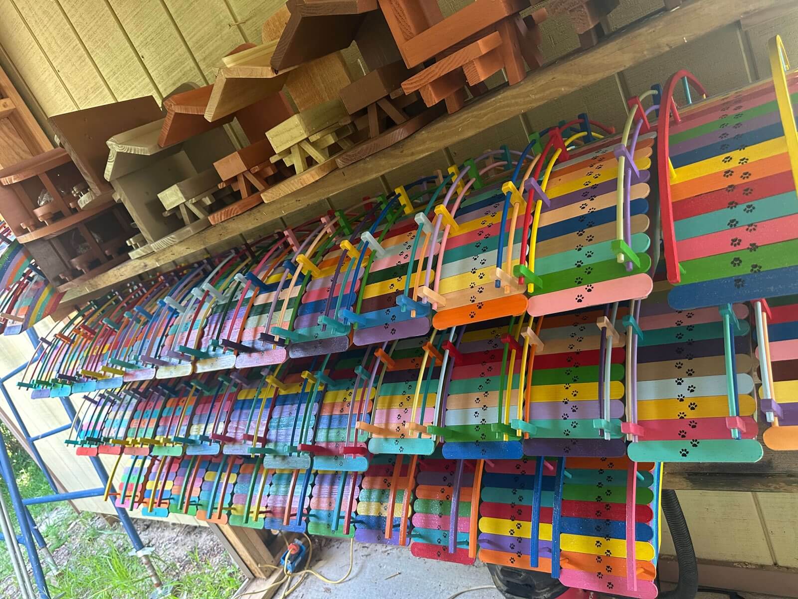 Paul's workshop overflowing with rainbow bridges and handcrafted squirrel feeders