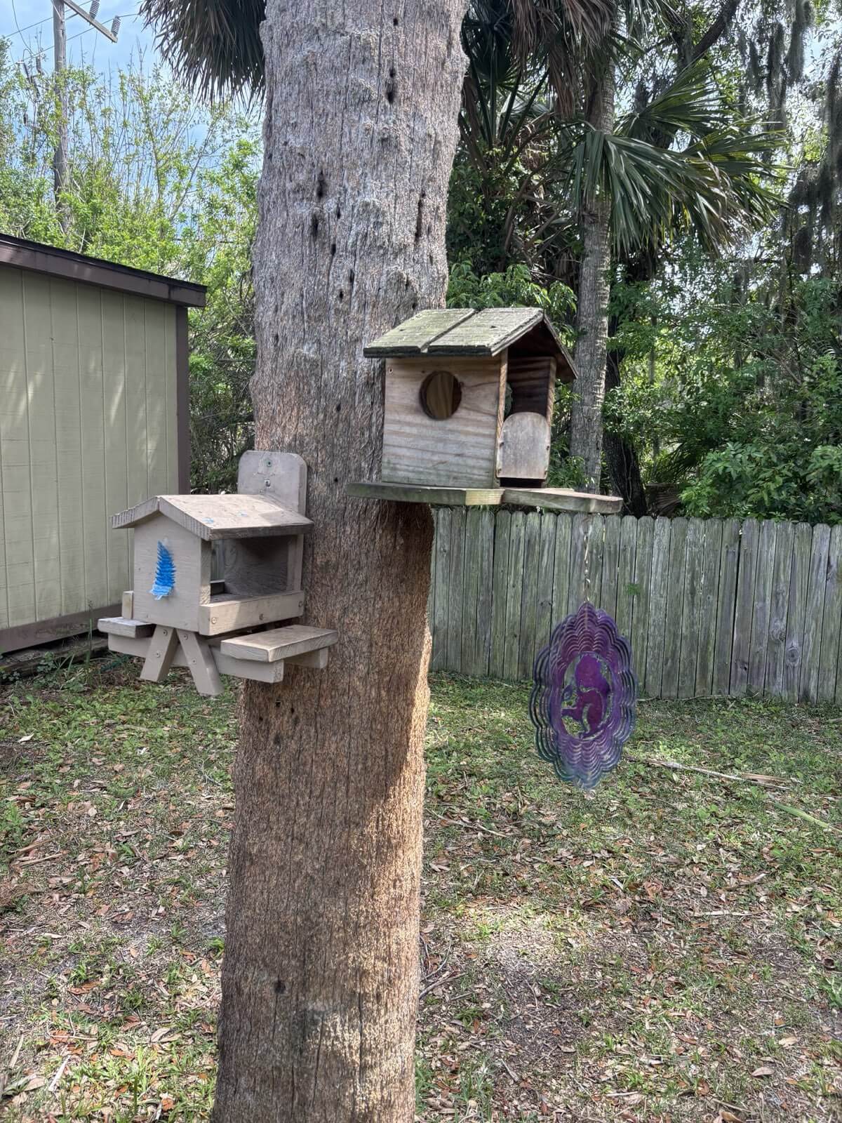 Finished bird and squirrel feeders handcrafted by Paul Allabaugh in his workshop